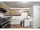Modern kitchen with stainless steel appliances and wooden cabinets at 1445 Bentcreek Dr, Marietta, GA 30062