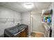 A functional laundry room with modern washer/dryer units and plenty of storage space at 1445 Bentcreek Dr, Marietta, GA 30062