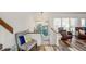 Cozy seating area featuring modern lighting, wood floors, and views to the outdoors from expansive windows at 1445 Bentcreek Dr, Marietta, GA 30062