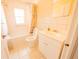 Bright bathroom with a tub shower and vanity at 1751 Tiger Flowers Nw Dr, Atlanta, GA 30314