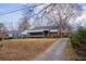 Charming brick home with covered porch and attached carport at 1751 Tiger Flowers Nw Dr, Atlanta, GA 30314