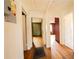 Hallway with hardwood floors that leads to additional rooms at 1751 Tiger Flowers Nw Dr, Atlanta, GA 30314