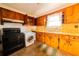 Functional kitchen with wood cabinets and modern appliances at 1751 Tiger Flowers Nw Dr, Atlanta, GA 30314