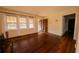 Spacious living room featuring hardwood floors, fireplace, and natural light at 1751 Tiger Flowers Nw Dr, Atlanta, GA 30314