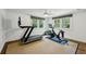 Exercise room with a treadmill, stationary bike, and plenty of natural light at 2628 Rivers Nw Rd, Atlanta, GA 30305