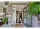 Welcoming foyer with black and white checkered floors and elegant chandelier at 2628 Rivers Nw Rd, Atlanta, GA 30305