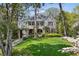 Charming two-story home with landscaped front yard and covered car port at 2628 Rivers Nw Rd, Atlanta, GA 30305
