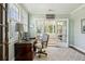 Cozy office with French doors, patterned rug, and natural light at 2628 Rivers Nw Rd, Atlanta, GA 30305
