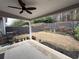 A cozy covered patio complements the backyard of this home, great for relaxing and entertaining outdoors at 2460 Laurel Gate Ln, Cumming, GA 30040