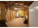 Unfinished basement presents a blank canvas with exposed beams, ready to customize into a living space at 2460 Laurel Gate Ln, Cumming, GA 30040