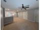 Open bonus room with carpeting, neutral paint, and a ceiling fan ready for your personal design ideas at 2460 Laurel Gate Ln, Cumming, GA 30040