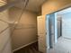 Walk-in closet featuring wire shelving and ample storage space at 2460 Laurel Gate Ln, Cumming, GA 30040