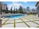 Inviting backyard pool and patio area, complete with modern design and ample space for relaxation at 4232 Edgewood Ct, Marietta, GA 30068