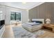 A serene main bedroom suite with hardwood floors, fireplace, and a sitting area at 4232 Edgewood Ct, Marietta, GA 30068