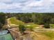 Scenic golf course with lush green fairways surrounded by mature trees and picturesque landscapes at 4232 Edgewood Ct, Marietta, GA 30068