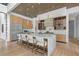 Modern kitchen with marble island, stainless steel appliances, and hardwood floors, perfect for entertaining at 4232 Edgewood Ct, Marietta, GA 30068
