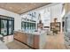 Open floor plan featuring the kitchen and living room with access to outdoor pool, perfect for modern living at 4232 Edgewood Ct, Marietta, GA 30068