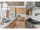 Elegant kitchen featuring a marble island, stainless steel appliances, and custom cabinetry for a modern feel at 4232 Edgewood Ct, Marietta, GA 30068