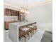 The kitchen features a breakfast bar, recessed lighting, modern decor, and stainless steel appliances at 4232 Edgewood Ct, Marietta, GA 30068
