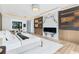 Stunning main bedroom features a fireplace, hardwood floors, accent lighting, and serene sitting area at 4232 Edgewood Ct, Marietta, GA 30068