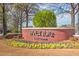 Attractive neighborhood sign surrounded by colorful flower beds and lush greenery at 4232 Edgewood Ct, Marietta, GA 30068