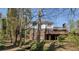 Backyard view of deck on brick home at 520 Willeo Rd, Roswell, GA 30075