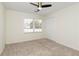 Bedroom featuring neutral walls, window with blinds, and closet at 520 Willeo Rd, Roswell, GA 30075