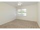 Empty bedroom with carpet and neutral colors, ready for personalization at 520 Willeo Rd, Roswell, GA 30075