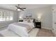 Comfortable bedroom with natural light and a ceiling fan at 520 Willeo Rd, Roswell, GA 30075