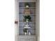 Charming built in shelves with simple decorative touches at 520 Willeo Rd, Roswell, GA 30075