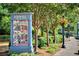 Roswell town center view with informative signage and manicured landscaping at 520 Willeo Rd, Roswell, GA 30075
