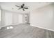 Bedroom featuring laminate wood flooring and a double door closet at 665 S Eugenia Nw Pl, Atlanta, GA 30318