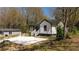 View of the renovated home highlighting fresh siding and backyard lot at 665 S Eugenia Nw Pl, Atlanta, GA 30318