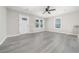 Sun-filled living room features neutral walls and modern flooring at 665 S Eugenia Nw Pl, Atlanta, GA 30318