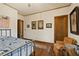 Spacious bedroom with wood floors, natural light, ceiling fan and comfortable furnishings at 1716 Rogers Sw Ave, Atlanta, GA 30310