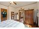 Bedroom featuring wood trim, hardwood floors, a ceiling fan, natural light and neutral walls at 1716 Rogers Sw Ave, Atlanta, GA 30310