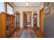 Inviting entryway with hardwood floors, wooden accents, and a view into other rooms at 1716 Rogers Sw Ave, Atlanta, GA 30310