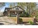 Charming two-story home with brick and stone accents, front porch, and a well-manicured lawn at 1716 Rogers Sw Ave, Atlanta, GA 30310