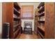 Hallway with bookshelves full of books, and a large picture at 1716 Rogers Sw Ave, Atlanta, GA 30310