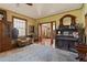Cozy living room with hardwood floors, a vintage rug, and traditional furniture at 1716 Rogers Sw Ave, Atlanta, GA 30310