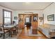 Inviting living room featuring hardwood floors, natural light, and traditional wood trim at 1716 Rogers Sw Ave, Atlanta, GA 30310