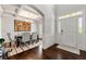 Chic dining room showcasing a coffered ceiling, stylish seating for six, and bright natural light at 3218 Garden Hill Ln, Douglasville, GA 30135
