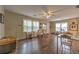 Bright living room with hardwood floors, neutral walls, and natural light streaming through the windows at 3540 Victoria St, Atlanta, GA 30337