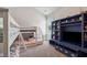 Bedroom with bunk beds, built-in shelving, and a window for natural light at 406 Dunaway Ct, Grayson, GA 30017