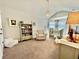 Cozy Bedroom with crib, chair, decor, and view of bay window at 406 Dunaway Ct, Grayson, GA 30017