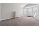 Spacious bedroom with natural light, neutral tones, and ample space for furnishings at 406 Dunaway Ct, Grayson, GA 30017
