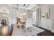 Charming dining space with modern finishes, stylish seating, and bright, natural lighting at 406 Dunaway Ct, Grayson, GA 30017