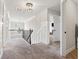 Upstairs hallway featuring elegant trim and views into other rooms in the home at 406 Dunaway Ct, Grayson, GA 30017