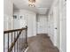 Second-floor hallway with clean white walls, multiple doors, and carpeted floor at 406 Dunaway Ct, Grayson, GA 30017