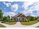 Charming pool house with ample seating and lush landscaping, creating a relaxing oasis at 406 Dunaway Ct, Grayson, GA 30017